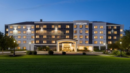 Courtyard by Marriott-Lancaster, the first Marriott-branded hotel in the U.S. to be 100% powered by solar energy, showcasing sustainable hotel practice.